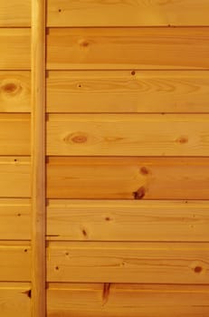 Vertical background - wall covered with planed wood