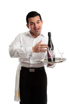 Jovial waiter, servant or bartender carrying a bottle of wine on a tray. White background.