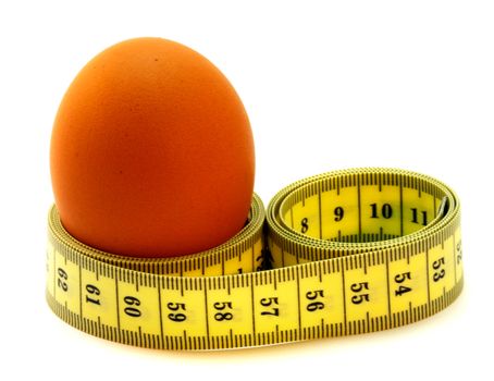 A egg with a measuring tape around it.