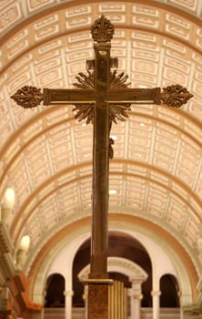 A golden cross inside the Cathedral of Mary, Queen of the World, in Montreal, Quebec, Canada.
