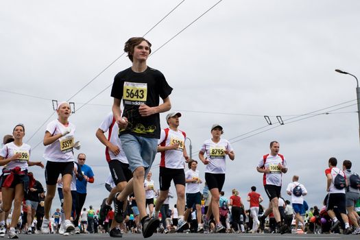 RIGA, LATVIA, MAY 17, 2009: Marathon runners start the Riga International Marathon on May 17