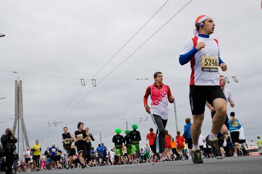 RIGA, LATVIA, MAY 17, 2009: Marathon runners start the Riga International Marathon on May 17