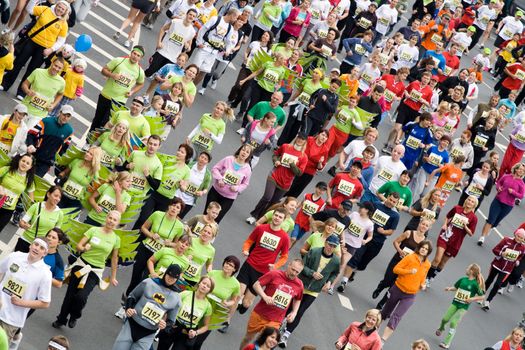 RIGA, LATVIA, MAY 17, 2009: MIni Marathon runners start the Riga International Marathon on May 17, 2009.