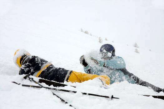 Girls playing in the snow on a skiing trip