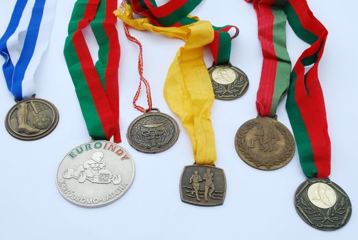 photo of a collection of medal awards from a sport competition