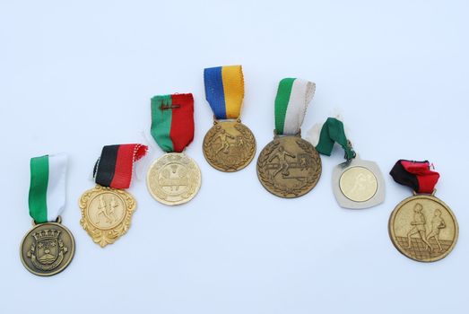 photo of a collection of medal awards from a sport competition