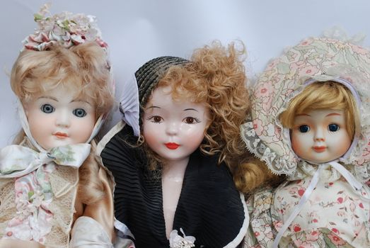 Portrait of a retro porcelain doll family