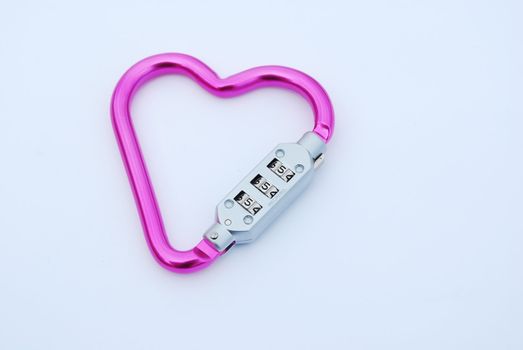 photo of a heart shaped violet carabiner with lockpad