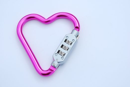 photo of a heart shaped violet carabiner with lockpad