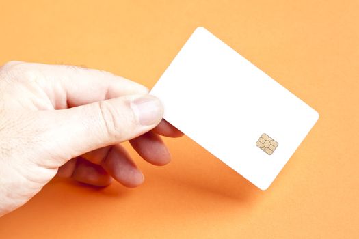 A man holding a blank smart card