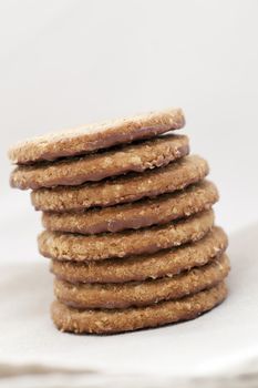 Stack of oatmeal cookies with bottom dippe in chocolate