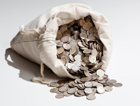 Linen bag of old pure silver coins used to invest in silver as a commodity