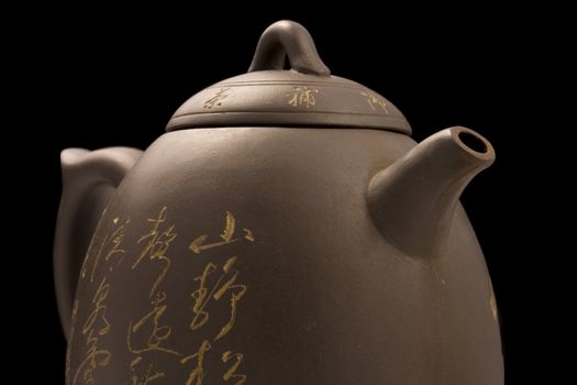 half of teapot  with clipping path over black background