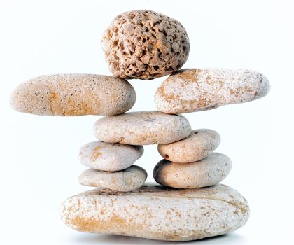 Several rocks balanced on each other, round and long boulders