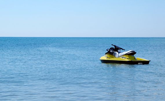 jet ski afloat in an open sea