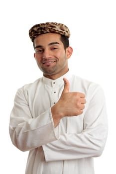 Ethnic mixed race man wearing a cultural clothing and vintage leopard skin topi hat.  He is smiling and giving thumbs up approval success.  White background.