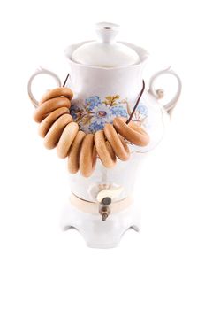 Samovar and bagels isolated over white