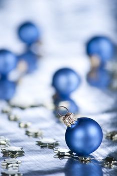 Christmas decoration with bauble. Selective focus on ball. aRGB. 