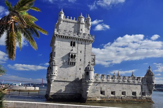 Castle on the river Tejo washed with water . Portugal, Lisbon: the tower of Belem in late gothic style was built at the 16th century to commemorate Vasco da Gama's expedition.