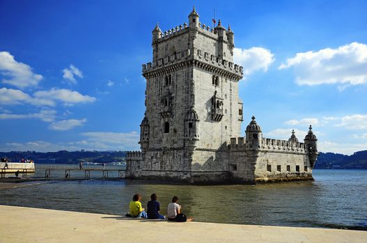 Castle on the river Tejo washed with water . Portugal, Lisbon: the tower of Belem in late gothic style was built at the 16th century to commemorate Vasco da Gama's expedition.