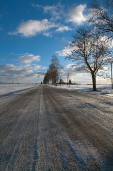 A snow covered rural landscape in the countryside Lithuania