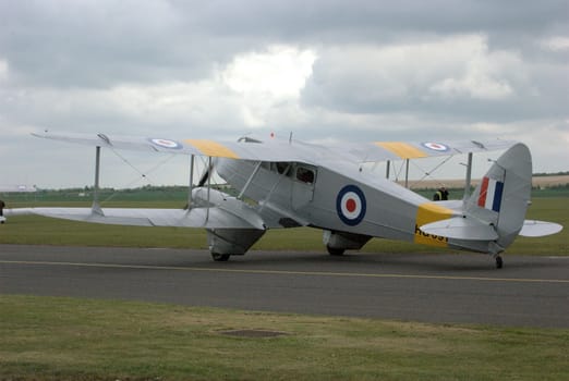 Bi-plane on runway