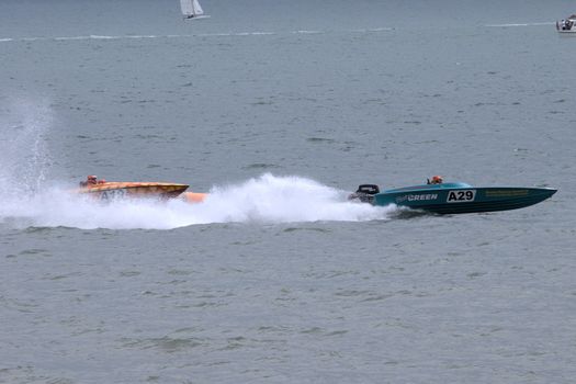 Two powerboats racing