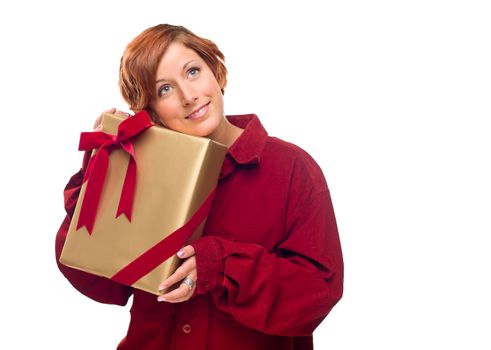 Pretty Red Haired Girl with Wrapped Gift Isolated on a White Background.