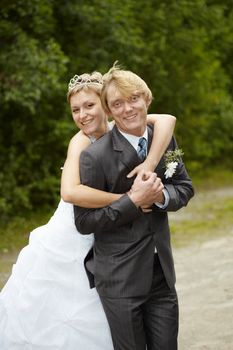 Cheerful and happy bride and groom - outdoor