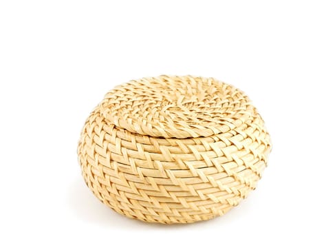 Wooden basket closed with matching top, towards white background