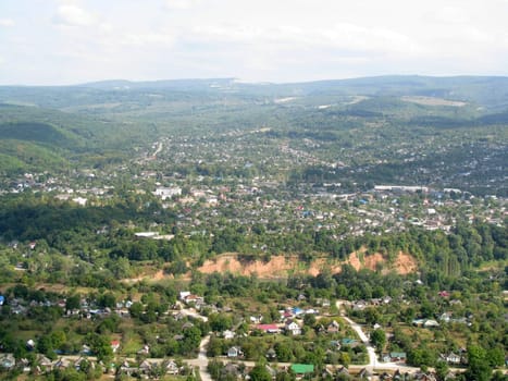 Mountains; rocks; a relief; a landscape; a hill; a panorama; Caucasus; top; a slope; a snow