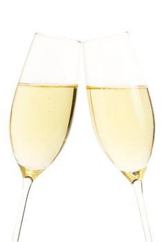 two aslope glasses with champagne isolated on white background