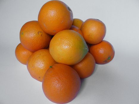A lot of oranges on white background