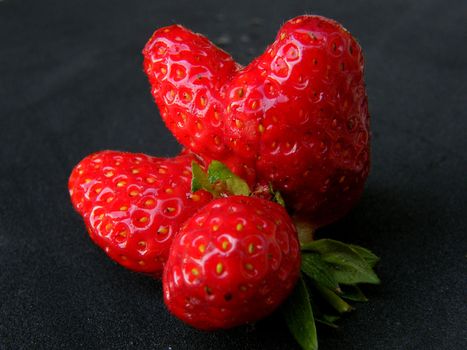 Strawberries on black background