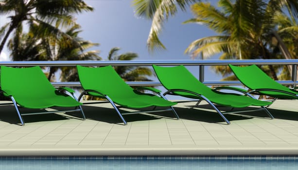 Sun chairs by the pool at fancy tropical resort