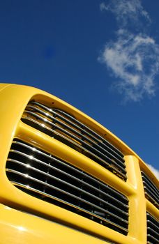 colorful truck grille close-up against blue sky