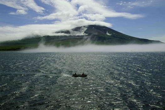 Landscapes of Kuriles, Boat in the sea 