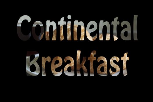 Continental Breakfast sign with Coffee and Croissants in the background