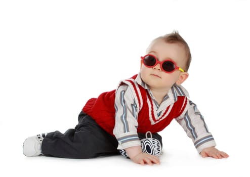 adorable 8 months cacasian baby boy with sunglasses