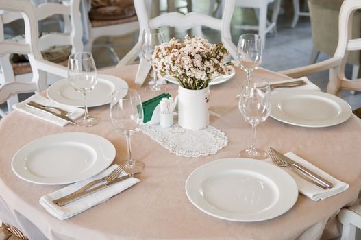 Fine Crystal set out with fine linen napkins and glasses