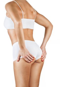 Beautiful healthy training female body isolated on white