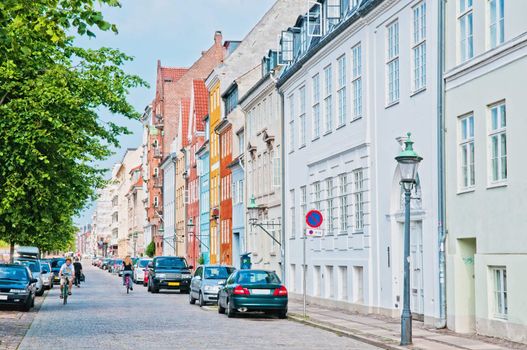 Quiet street with pedestrians in the bustling capital