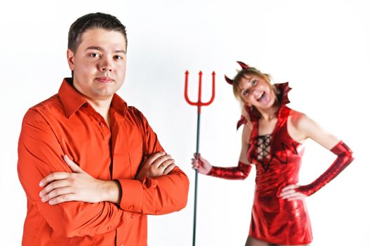Red devil couple on white background