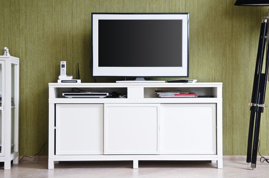 White TV-set in modern stylish home interior