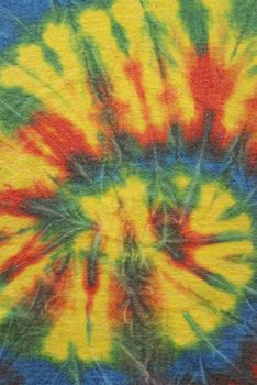 A macro shot of some tie dyed cotton fabric.