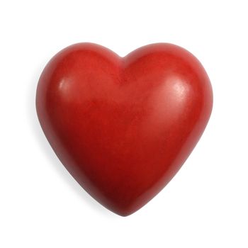 Photo of a heart-shaped red stone on a white background.  Slight shadow on the left and clipping path included.
