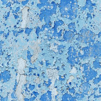 Damaged paint on a concrete wall - a seamless background