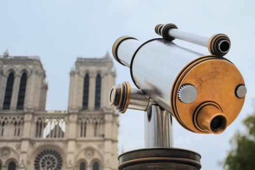 Telescope of stainless steel near Notre-Dame Cathedral in Paris