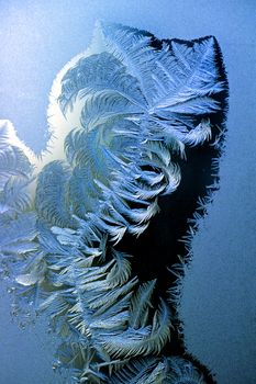 Frost of a window pane in a cold Alaskan cabin