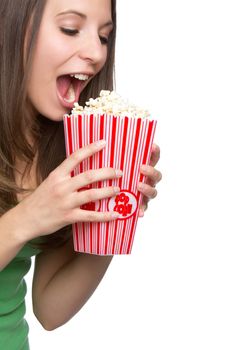 Beautiful hungry girl eating popcorn